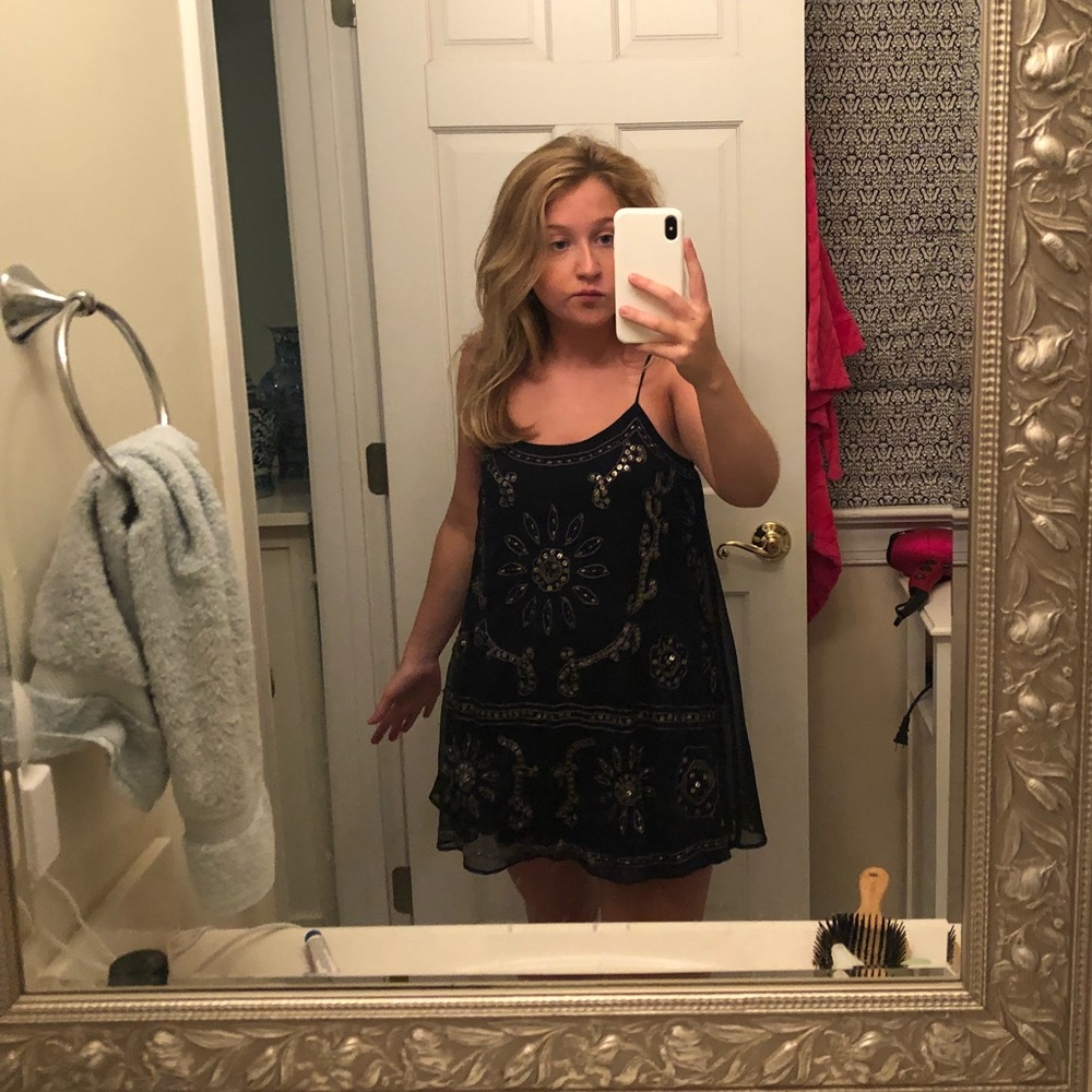 Mini navy dress that’s beaded